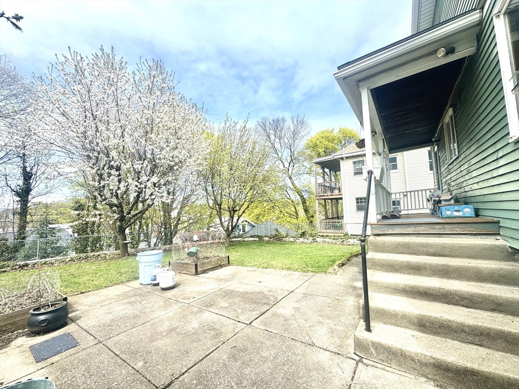 53 Breck Avenue Boston, MA 02135 - Photo 32 of 35 a view of yard along with trees