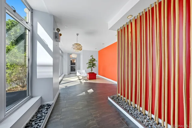 a view of a living room and staircase