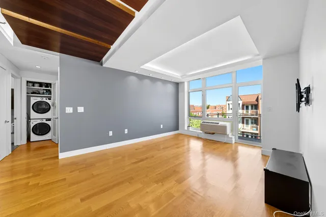 a view of a livingroom with a flat screen tv
