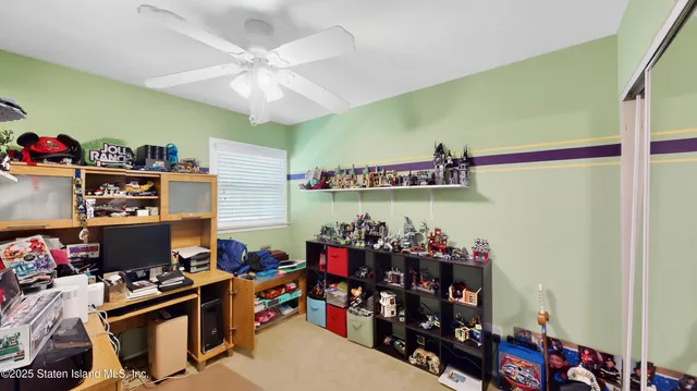 a room with lots of different colored cloths