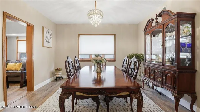 a kitchen with a stove a refrigerator and a sink