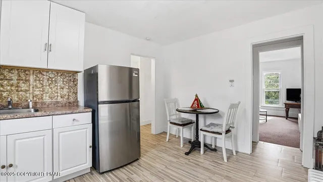 a bedroom with a bed and dresser