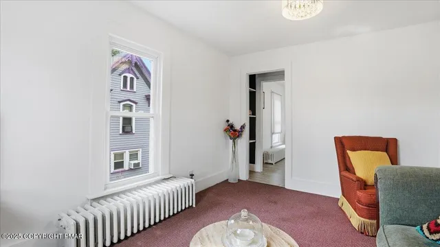 a view of an empty room and window