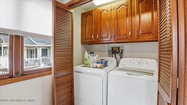 a view of a chairs and table in the balcony