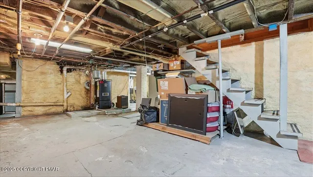 a view of a balcony with chairs
