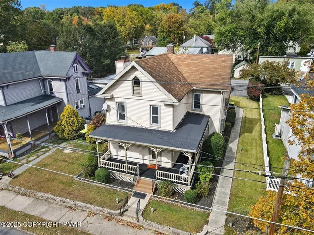 a front view of a house with balcony