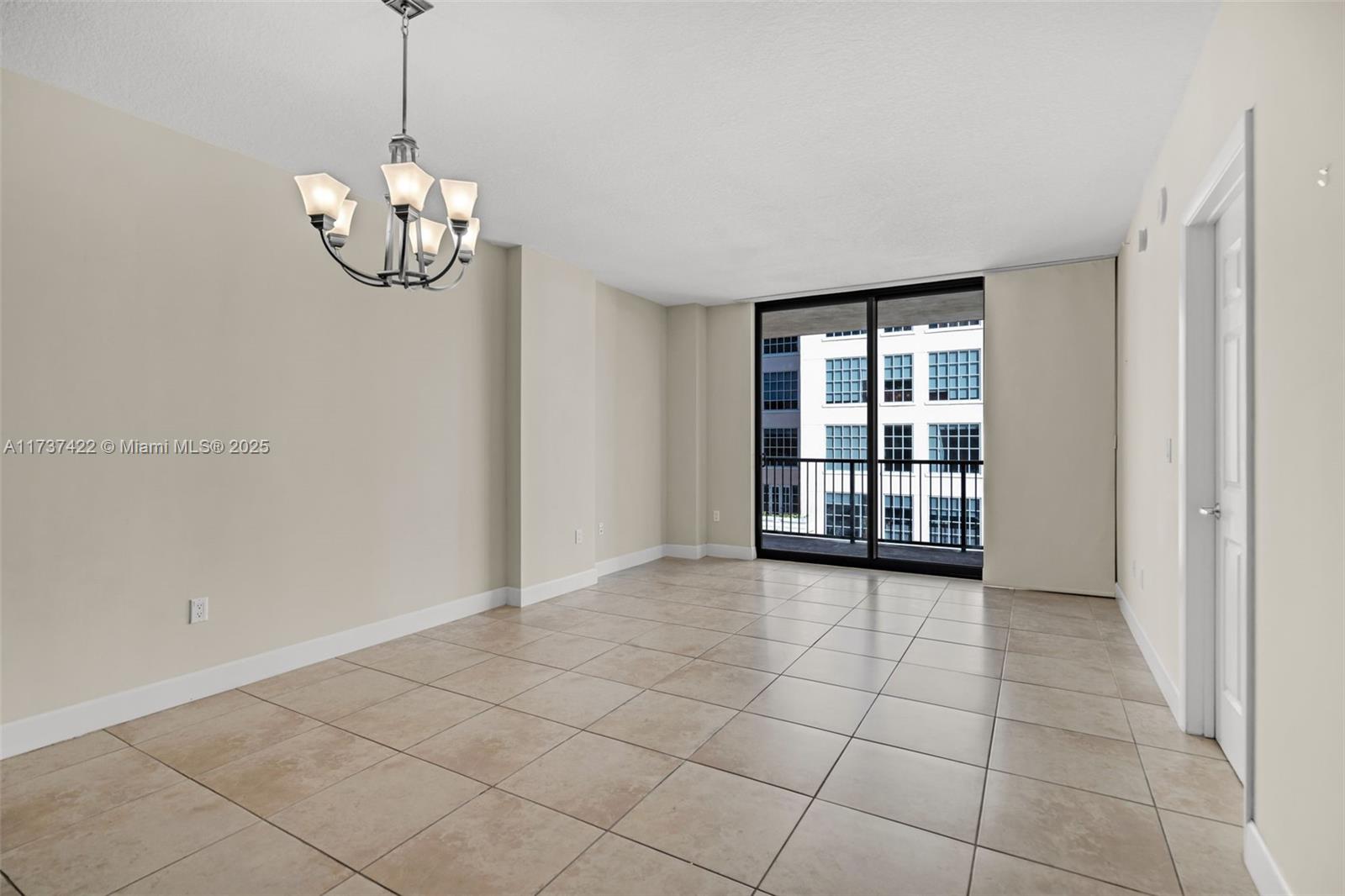 55 Merrick Way, Unit 624 Coral Gables, FL 33134 - Photo 8 of 41 a view of an empty room with a window