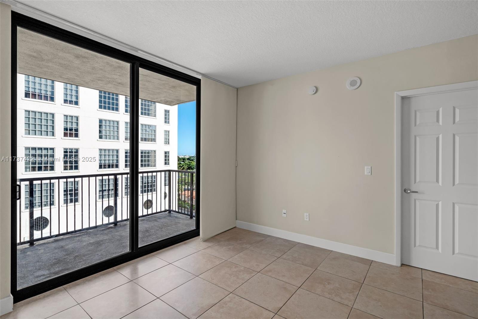55 Merrick Way, Unit 624 Coral Gables, FL 33134 - Photo 10 of 41 a view of a large window with an outdoor space