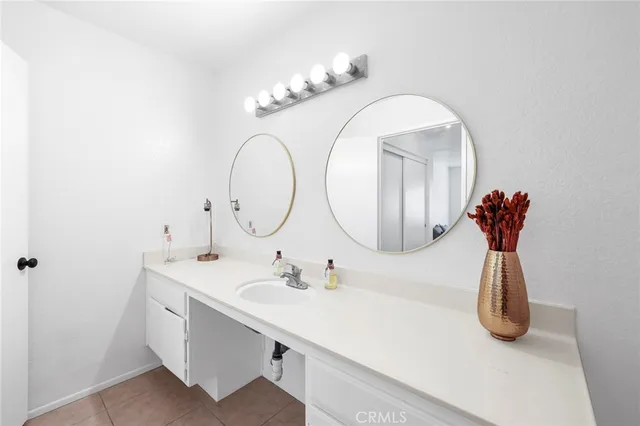 a bathroom with a toilet and a shower curtain