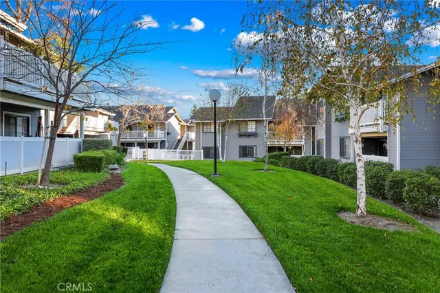 an aerial view of a house with outdoor space