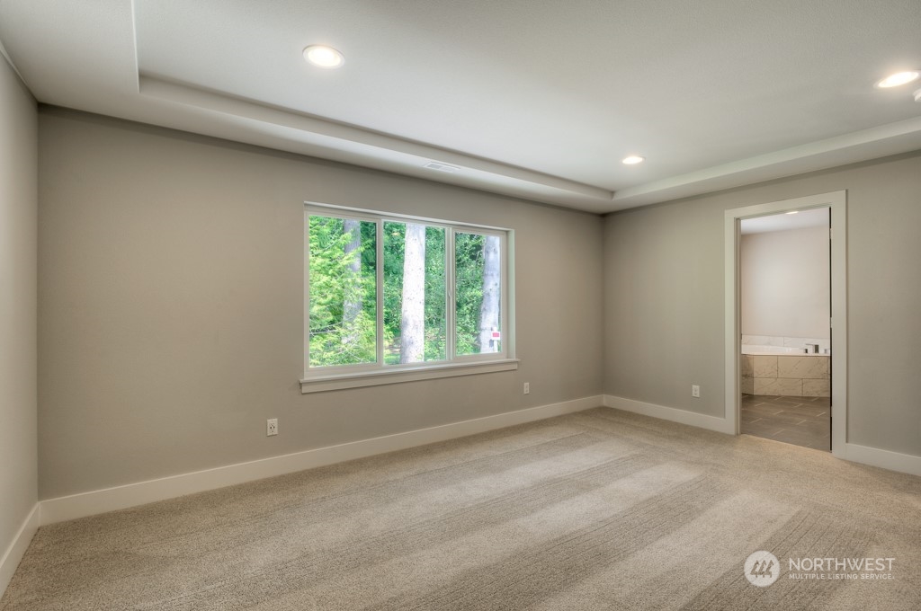 13 178th Place Southwest Bothell, WA 98012 - Photo 13 of 26 an empty room with windows and closet