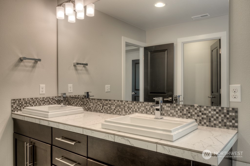 13 178th Place Southwest Bothell, WA 98012 - Photo 18 of 26 a bathroom with a sink and a mirror