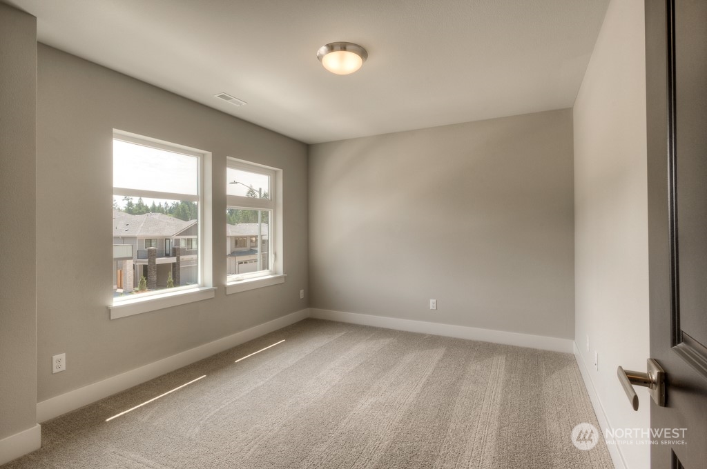 13 178th Place Southwest Bothell, WA 98012 - Photo 22 of 26 a view of an empty room with a window