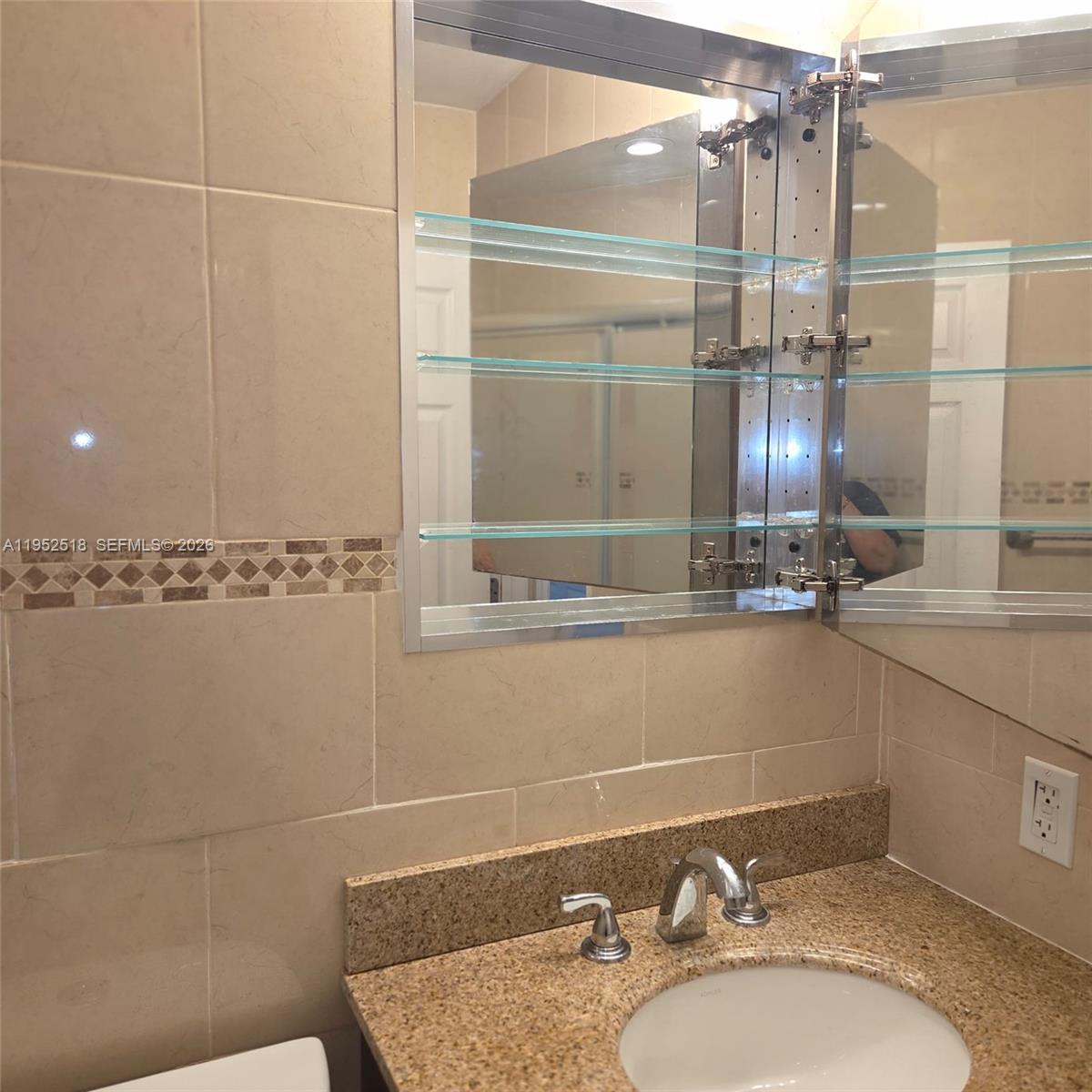 7401 Southwest 21st Street Miami, FL 33155 - Photo 11 of 31 a bathroom with a sink and a mirror