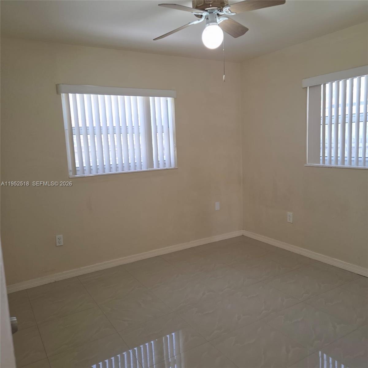 7401 Southwest 21st Street Miami, FL 33155 - Photo 17 of 31 an empty room with a window