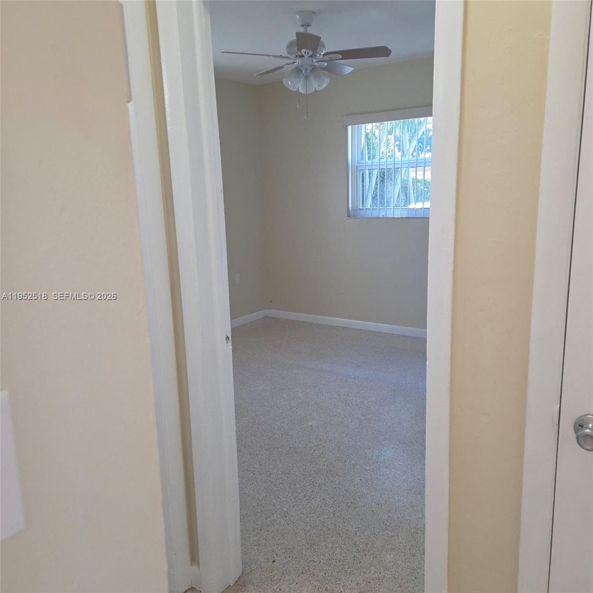 7401 Southwest 21st Street Miami, FL 33155 - Photo 25 of 31 an empty room with windows