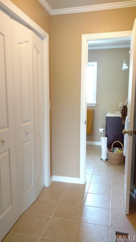 335 Puddin Ridge Road Moyock, NC 27958 - Photo 15 of 29 Hallway bathroom and laundry room