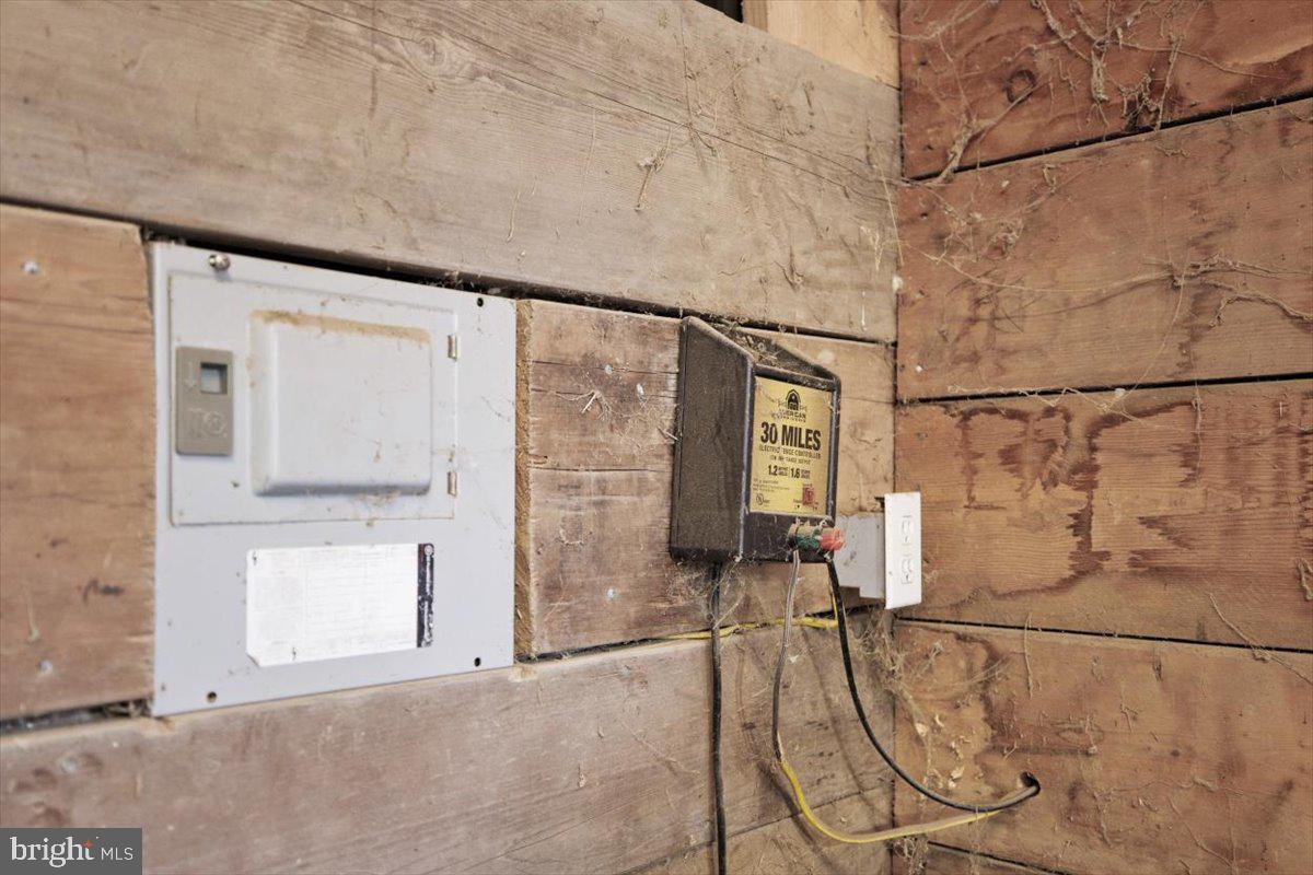 244 Muddy Road Augusta, WV 26704 - Photo 13 of 33 a view of a room with rack on the wall and gym equipment