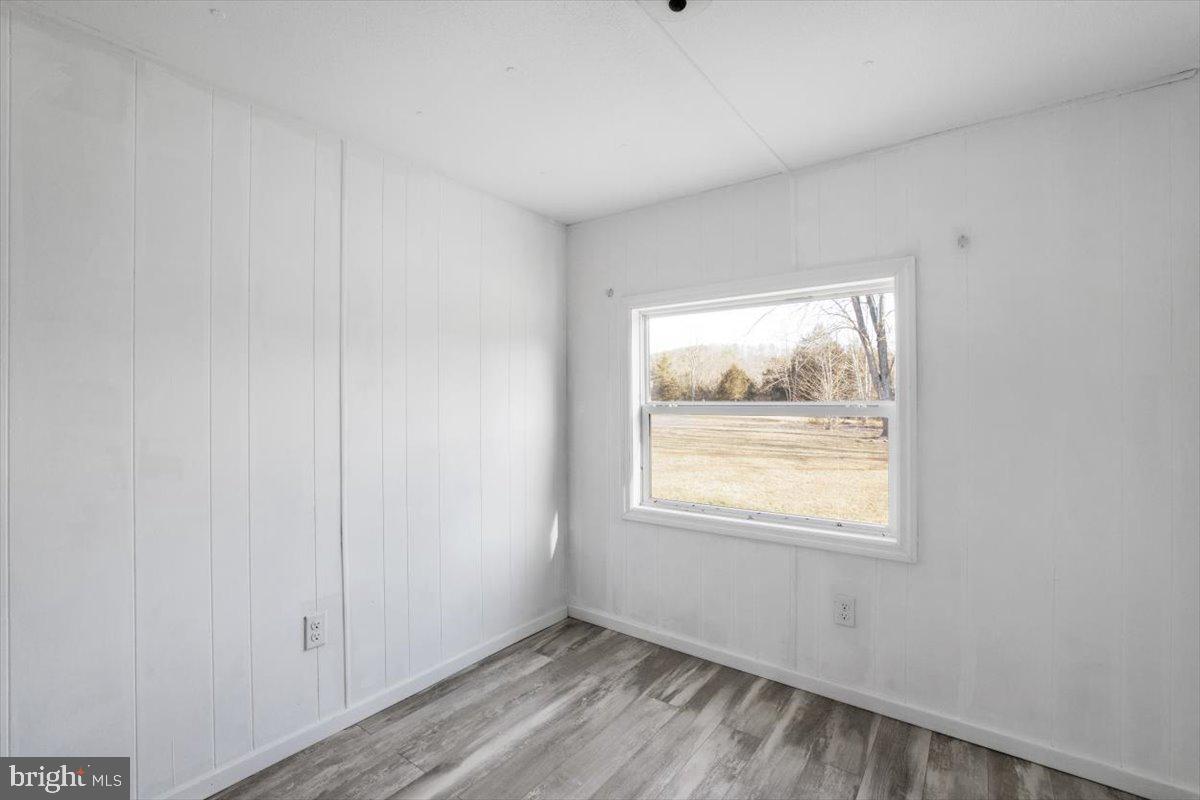 244 Muddy Road Augusta, WV 26704 - Photo 27 of 33 an empty room with a window