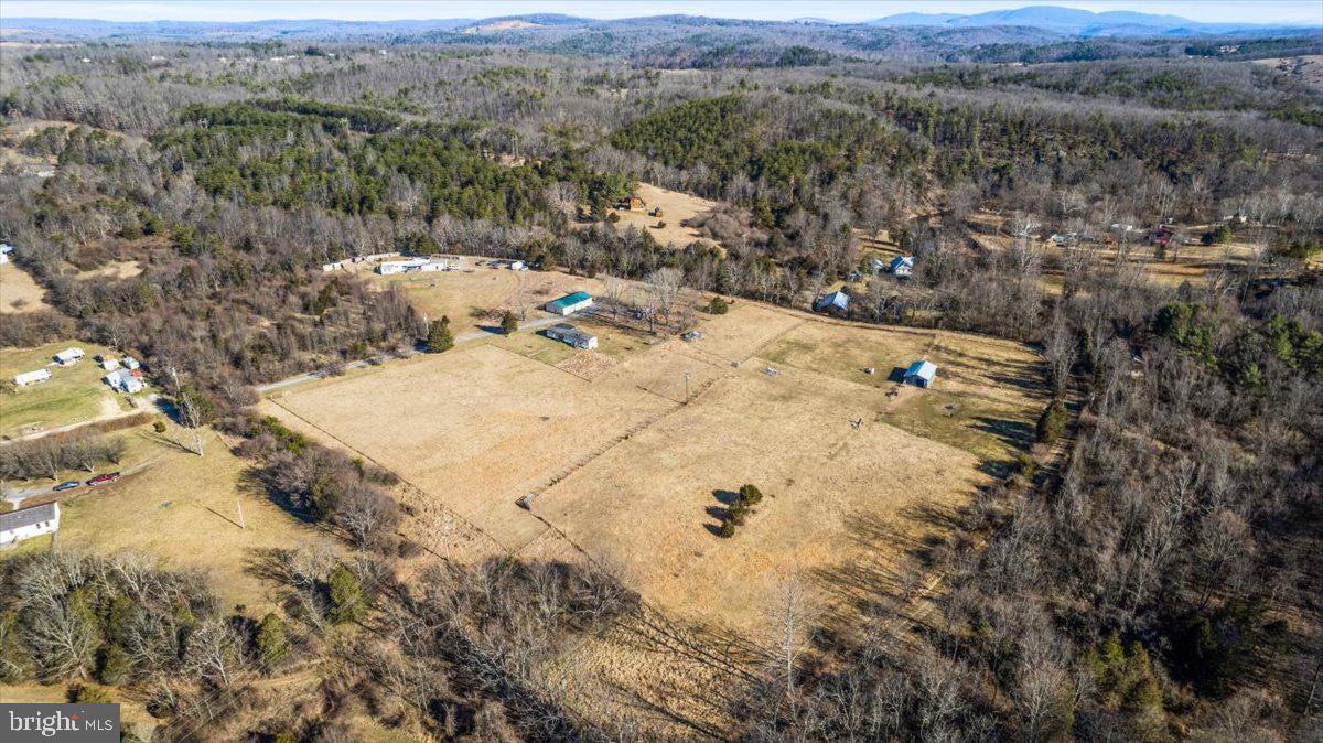 244 Muddy Road Augusta, WV 26704 - Photo 7 of 33 a view of a dry yard with mountains in the background