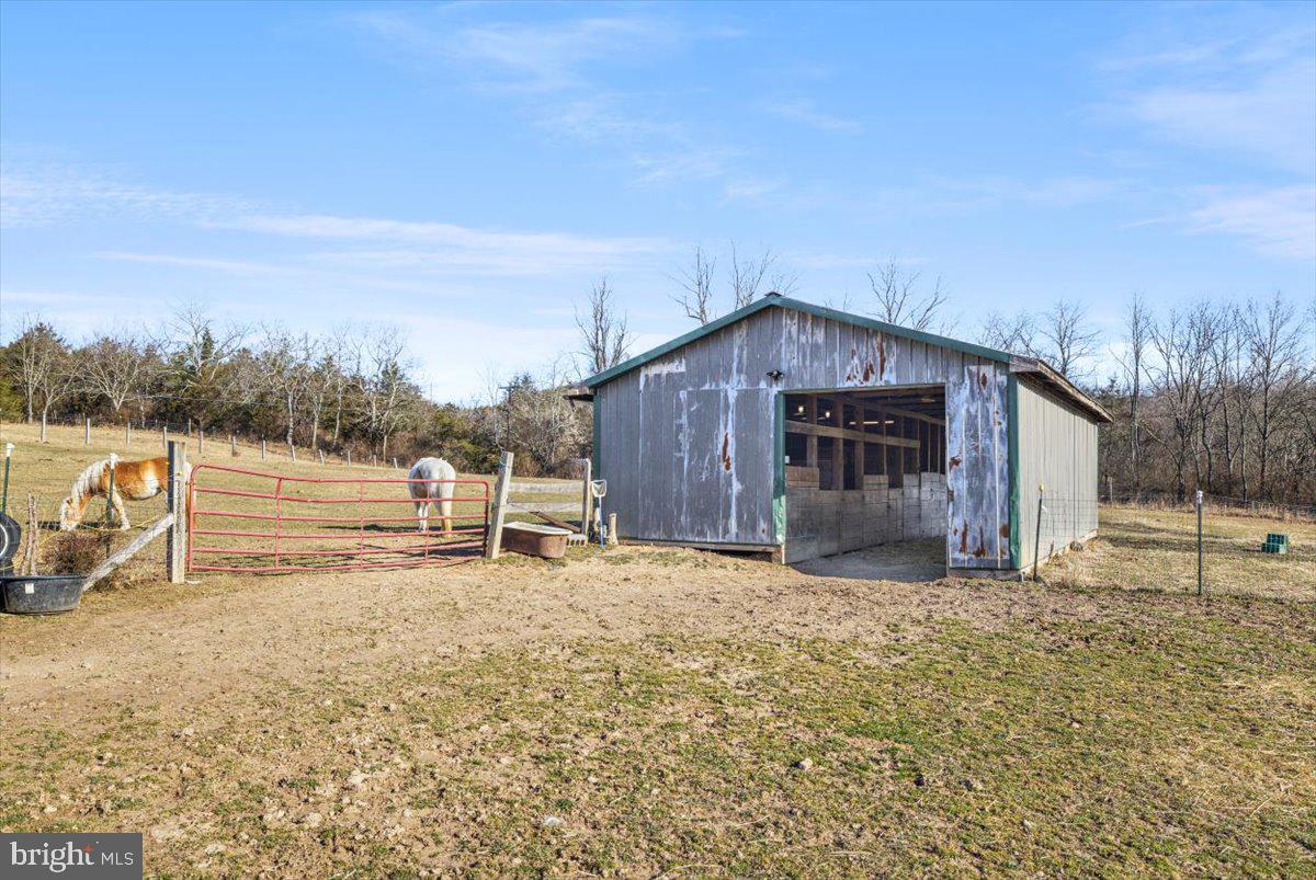 244 Muddy Road Augusta, WV 26704 - Photo 10 of 33 a big room with an outdoor space