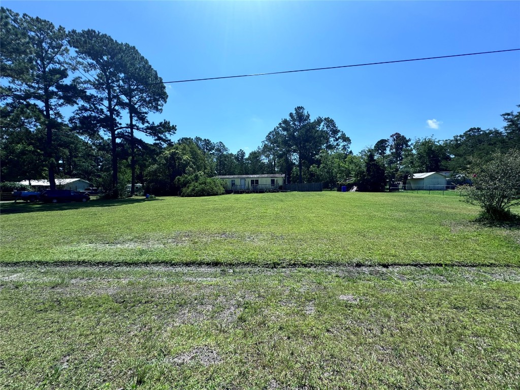 54440 Bea Road Callahan, FL 32011 - Photo 2 of 10 a view of a field with grass