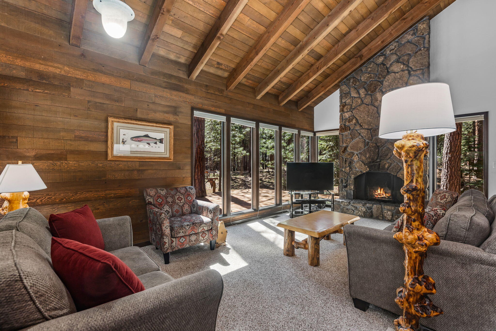 13701 Partridge Foot, Unit RR83 Black Butte Ranch, OR 97759 - Photo 6 of 40 Main living area w/wood paneling & beams.