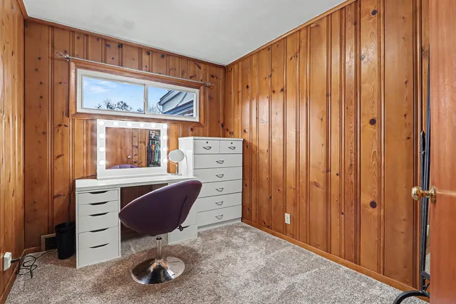 a view of a workspace with furniture