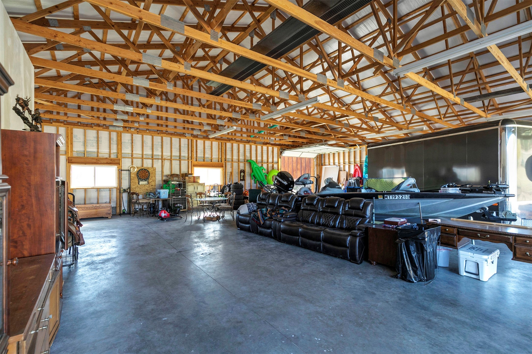 203 Hart Bench Road Darby, MT 59829 - Photo 47 of 56 The hangar is impressively spacious, offering versatile space for aircraft, vehicles, hobbies, or recreational pursuits.