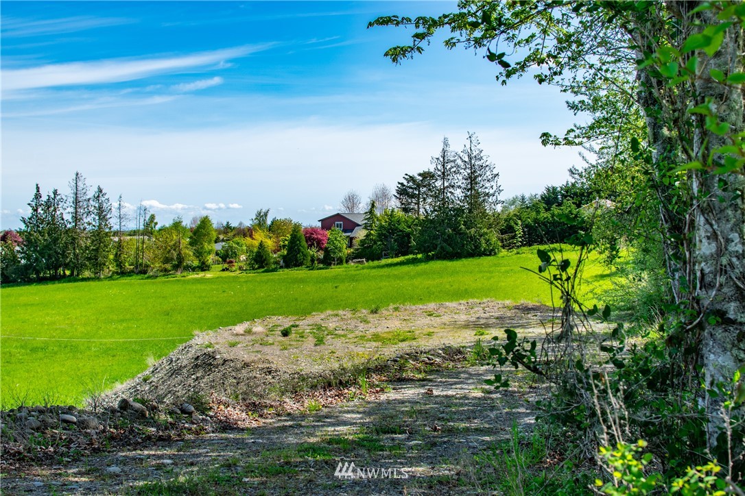 1945 Atterberry Road Sequim, WA 98382 - Photo 18 of 25 a view of a golf course with a lake