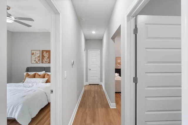 a bedroom with a bed and a walk in closet