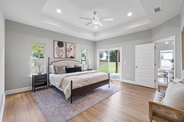 a bed room with a bed and a couch