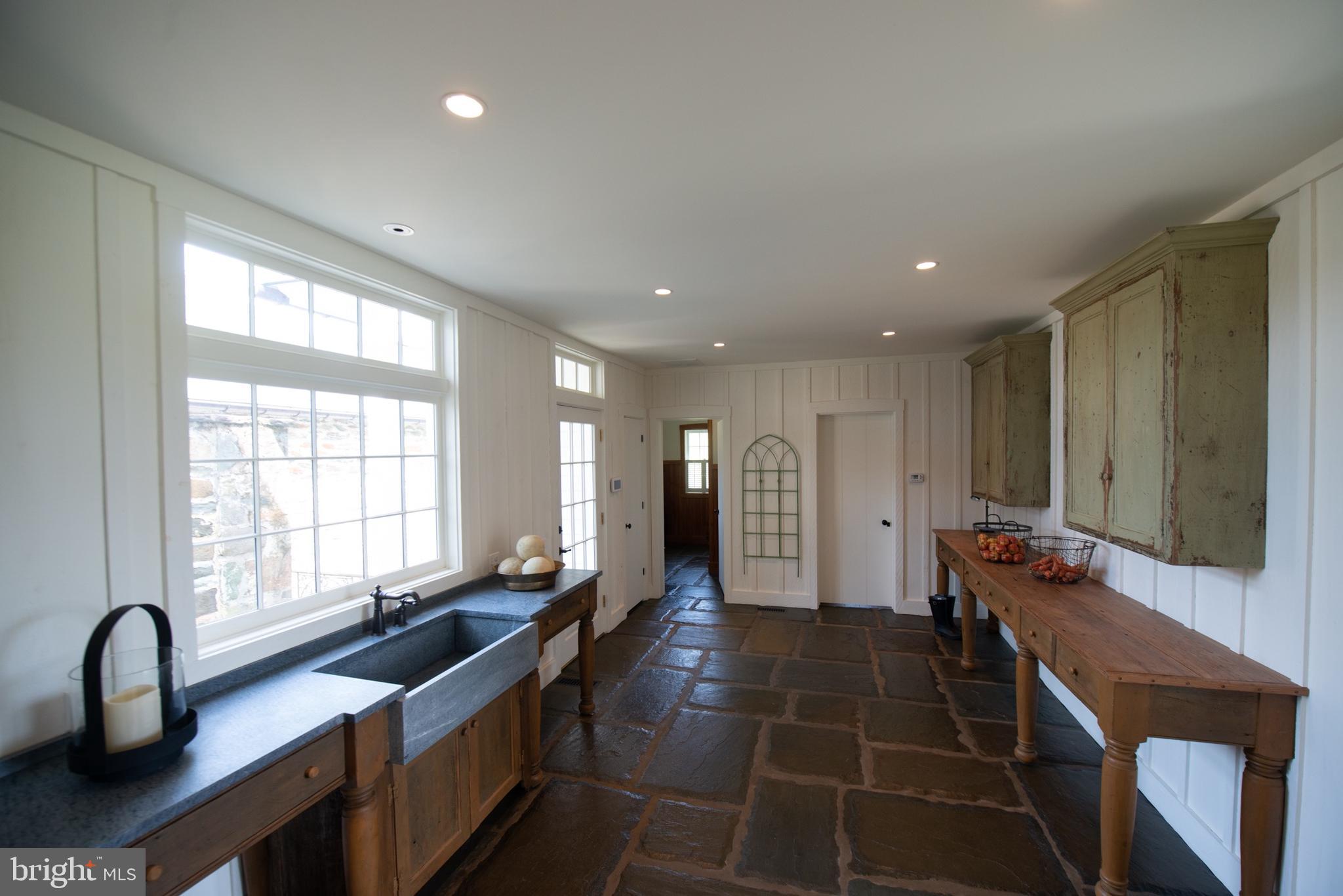 8669 Springs Road Warrenton, VA 20186 - Photo 15 of 50 Spacious Mudroom with Separate Laundry Room