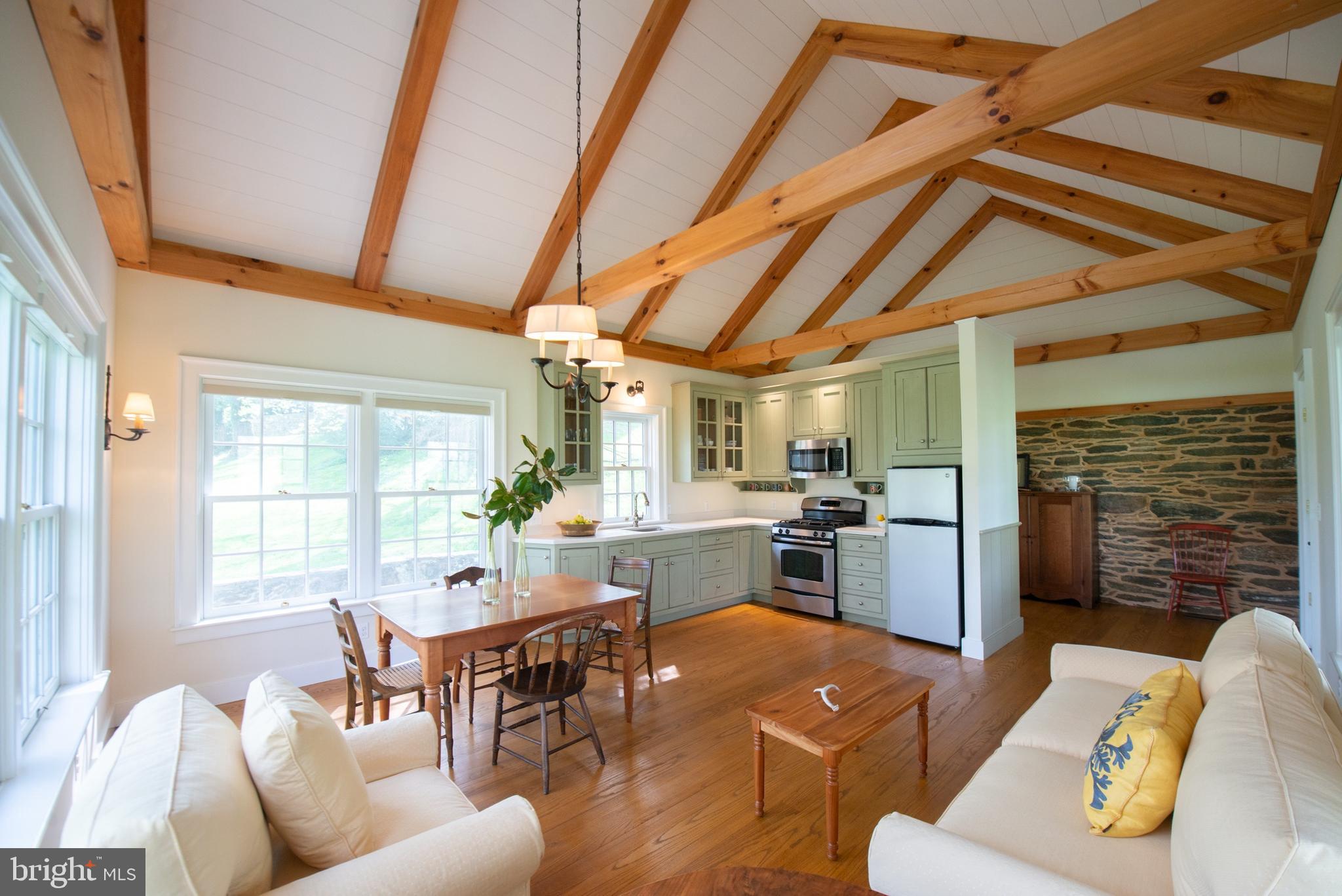 8669 Springs Road Warrenton, VA 20186 - Photo 34 of 50 Great Room Opens to Full Kitchen