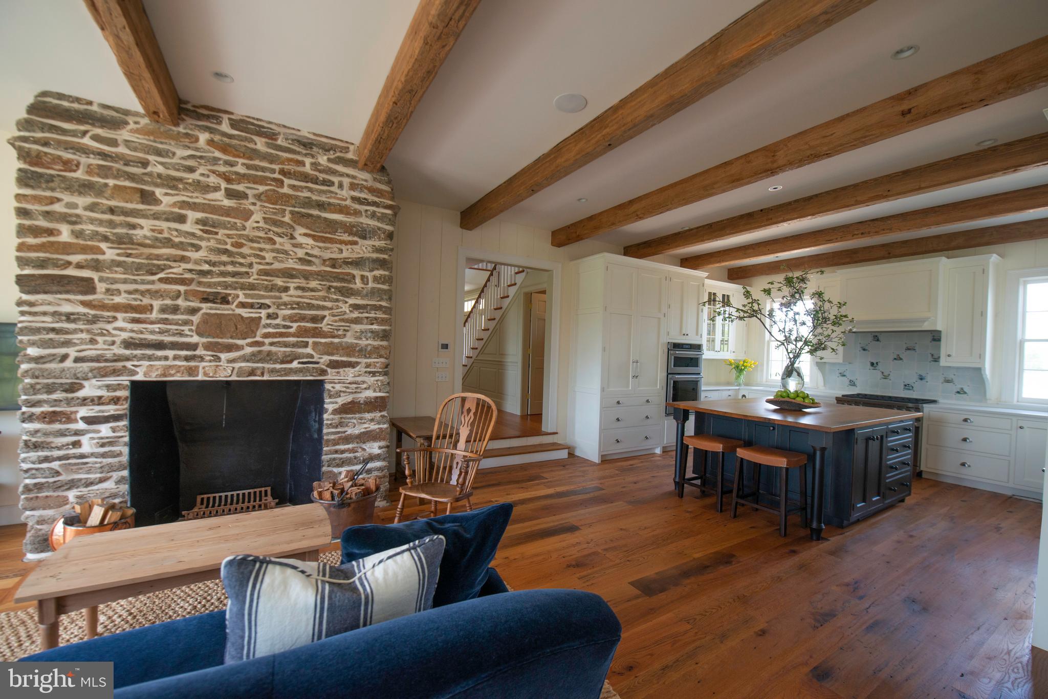 8669 Springs Road Warrenton, VA 20186 - Photo 9 of 50 Great Room with Stone Fireplace. Easy Flow
