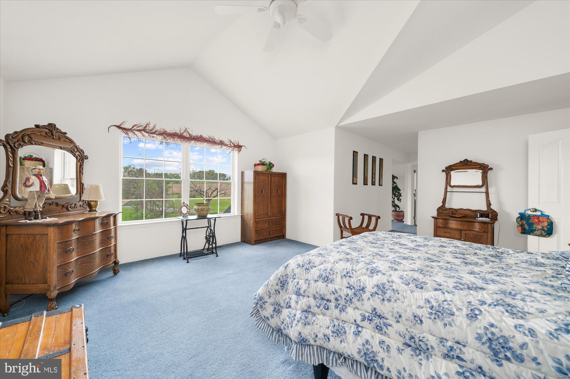 861 Dunkels Church Road Kutztown, PA 19530 - Photo 31 of 55 a large bedroom with a bed and a large window