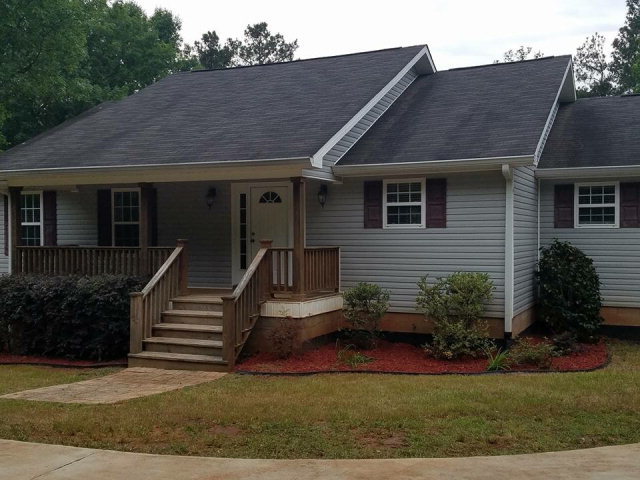 a front view of house with yard