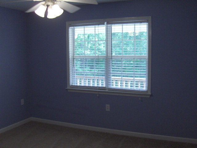 832 Cumslo Road Gray, GA 31032 - Photo 14 of 22 an empty room with a window