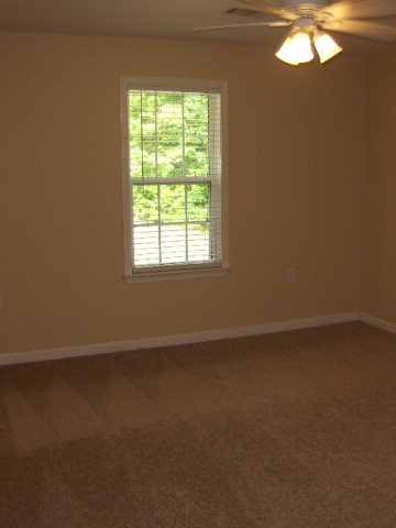 832 Cumslo Road Gray, GA 31032 - Photo 15 of 22 an empty room with a window