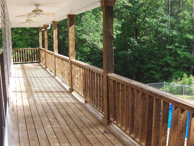 832 Cumslo Road Gray, GA 31032 - Photo 17 of 22 a view of balcony with wooden floor