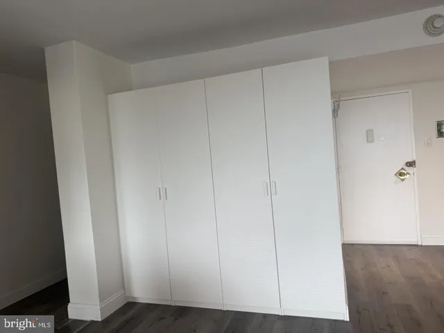 a view of room with hardwood floor