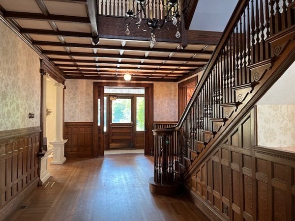 325 Longhill Street Springfield, MA 01108 - Photo 3 of 39 a view of entryway with wooden floor and stairs
