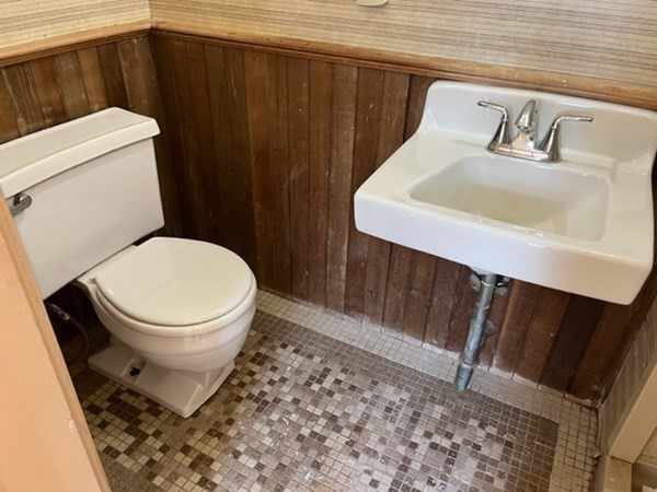 325 Longhill Street Springfield, MA 01108 - Photo 32 of 39 a bathroom with a toilet and a sink
