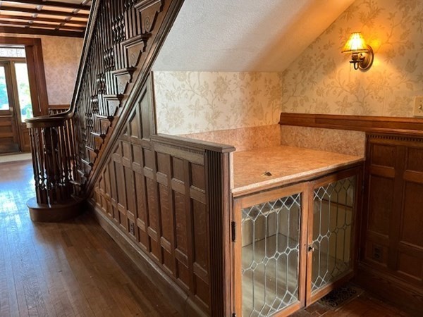 325 Longhill Street Springfield, MA 01108 - Photo 4 of 39 a view of staircase with railing and a window
