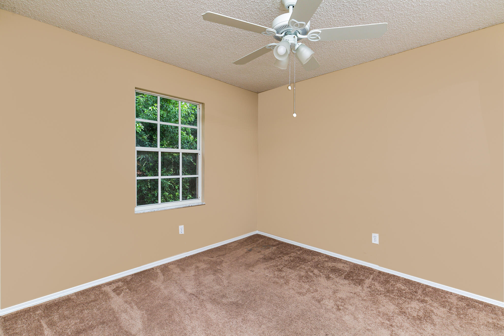 2904 Southeast Bella Road Port St. Lucie, FL 34984 - Photo 19 of 30 an empty room with a window