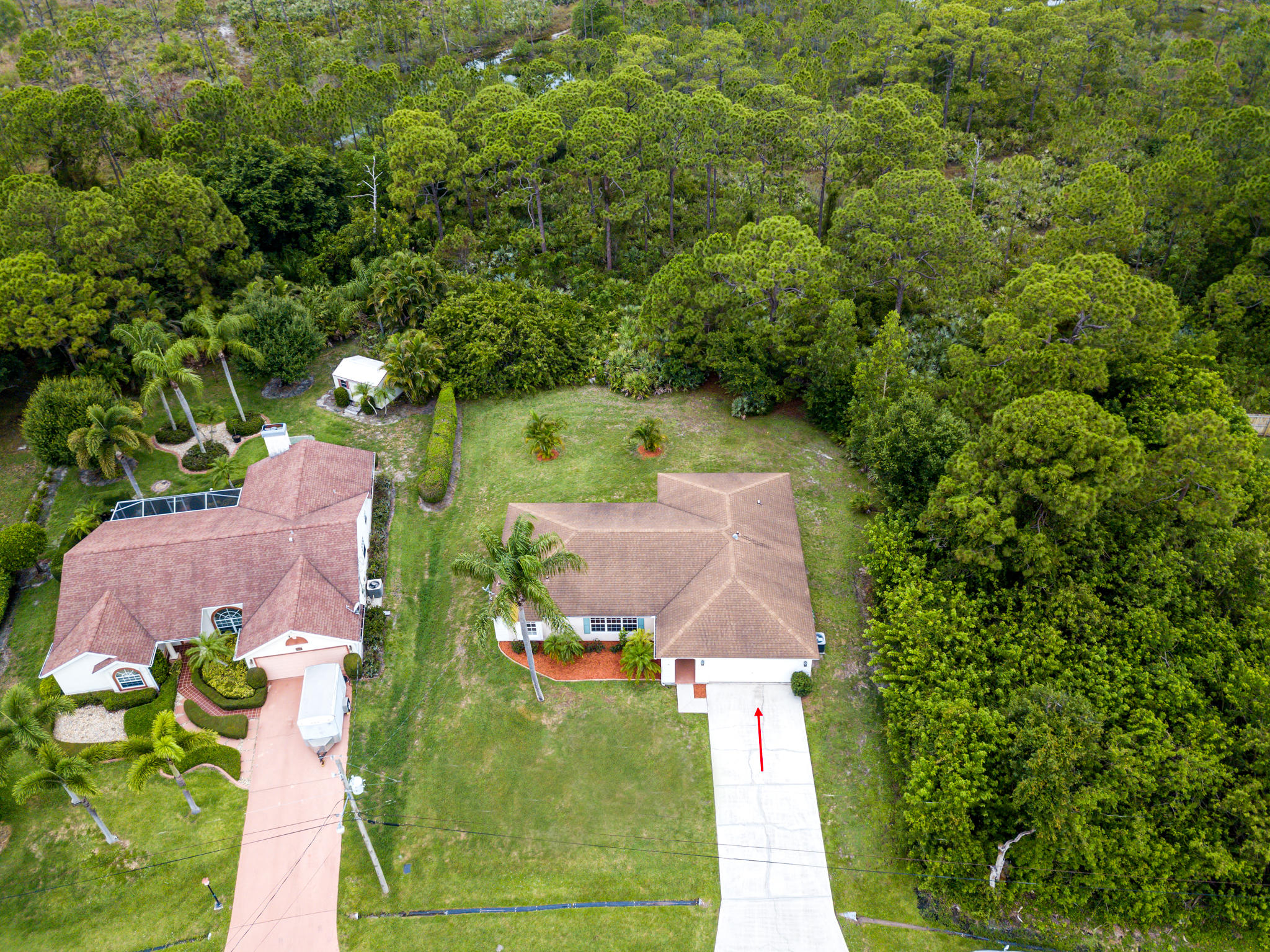 2904 Southeast Bella Road Port St. Lucie, FL 34984 - Photo 29 of 30 an aerial view of a house with a yard basket ball court and outdoor seating