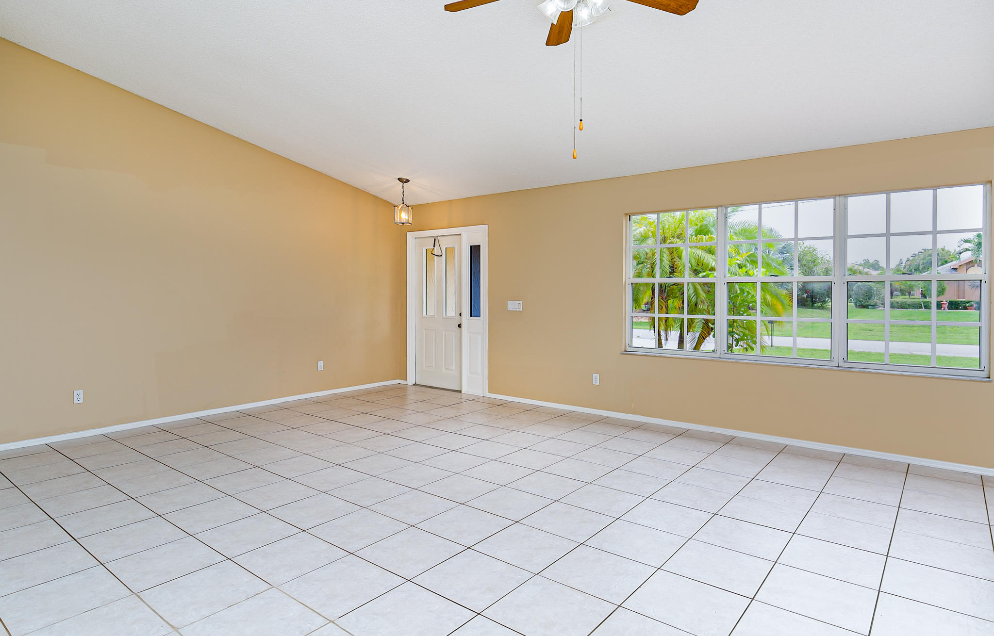 2904 Southeast Bella Road Port St. Lucie, FL 34984 - Photo 6 of 30 an empty room with windows
