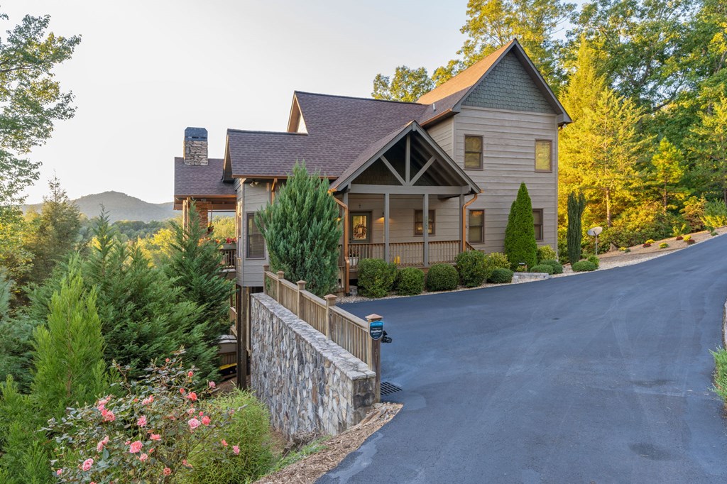 1144 Settler's Ridge Road Ellijay, GA 30540 - Photo 62 of 88 a front view of a house with a yard