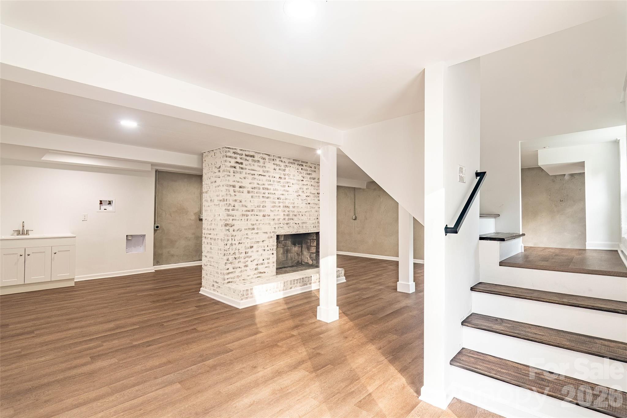 281 Jack McKinney Road Forest City, NC 28043 - Photo 24 of 37 a view of an entryway with wooden floor and stairs