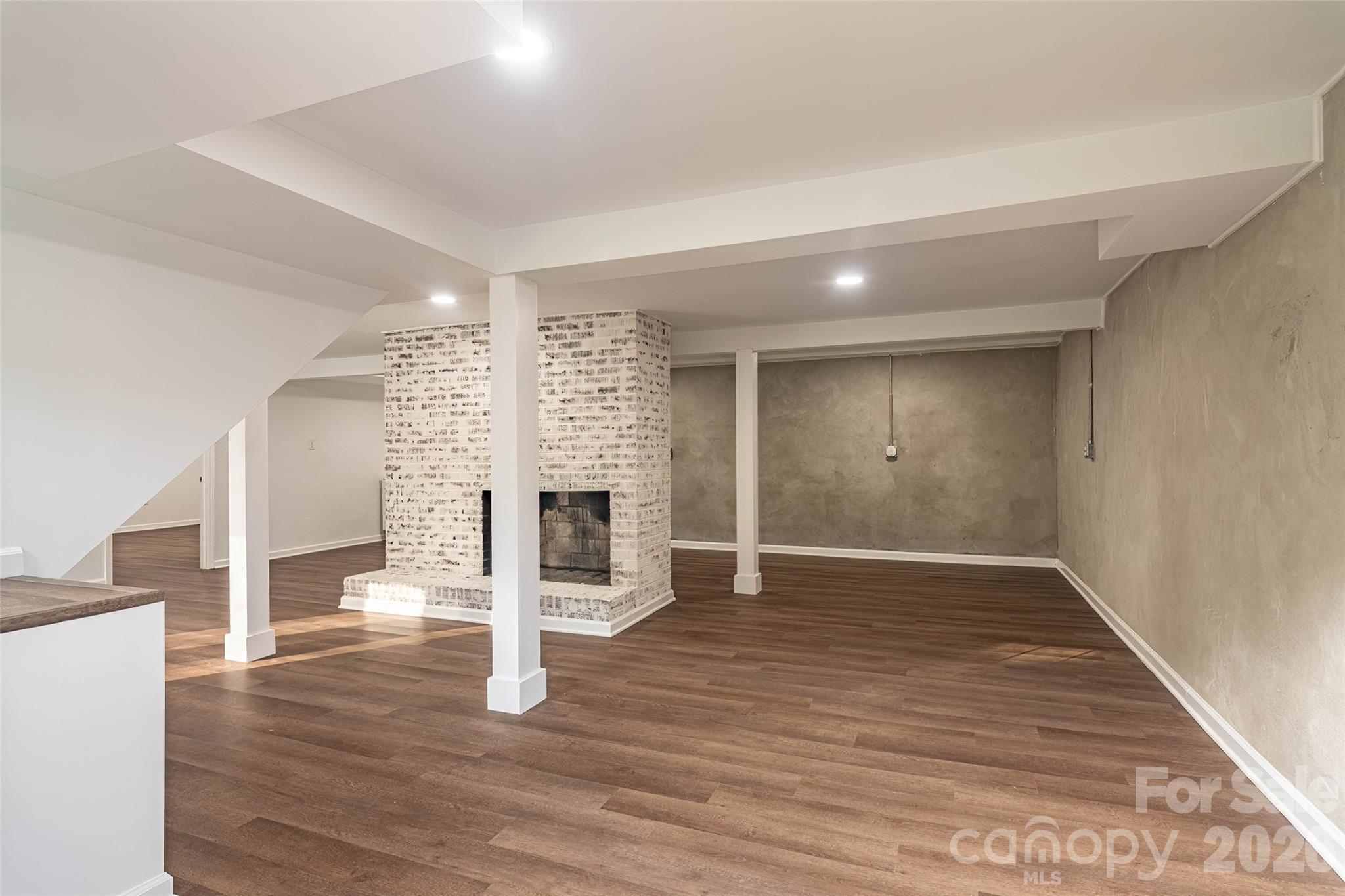 281 Jack McKinney Road Forest City, NC 28043 - Photo 25 of 37 a view of empty room with wooden floor